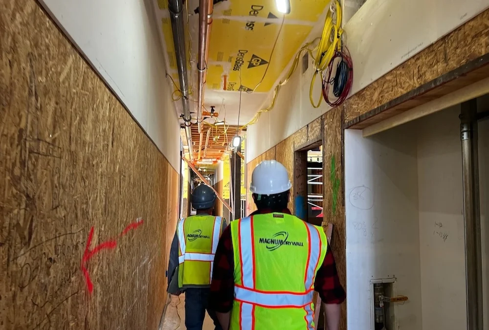 When you hire a professional painting contractor, they get the job done. Here are two members of the Magnum Drywall team tackling a commercial painting project in the Bay Area.